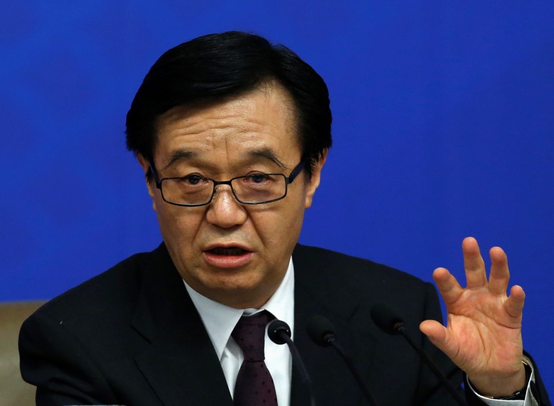 © Reuters. China's Commerce Minister Gao Hucheng speaks during a news conference as a part of the National People's Congress in Beijing