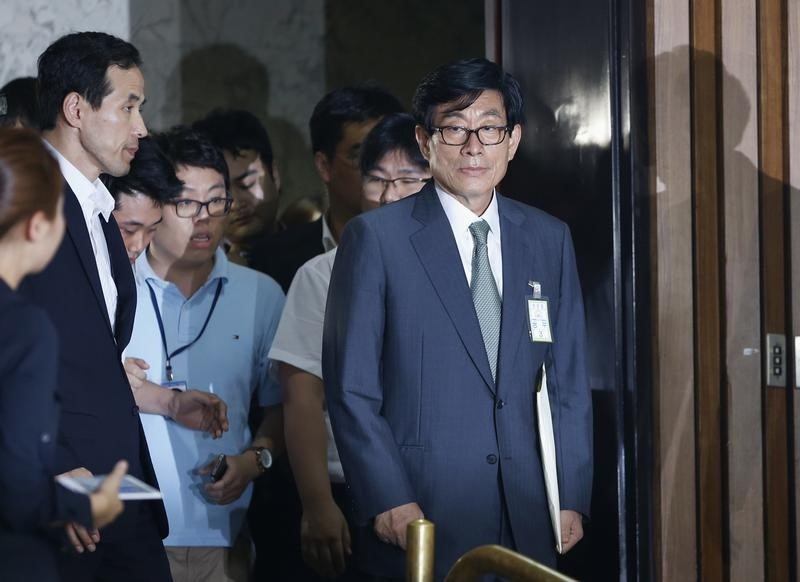 © Reuters. Won, former chief of South Korea's state intelligence agency NIS, arrives at parliamentary investigative committee at parliament in Seoul