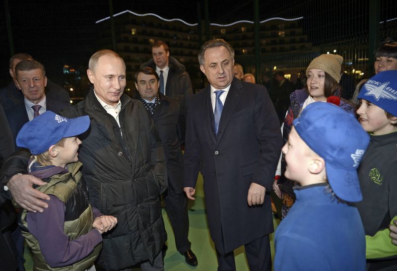 © Reuters. Russian President Putin and Sports Minister Mutko visit a youth sports and health centre for gifted children in Sochi