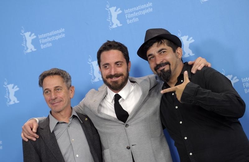 © Reuters. Actor Castro, director Pablo Larrain and actor Farias pose during a photo call to promote the in-competition film "El Club" (The Club) at the 65th Berlinale International Film Festival in Berlin