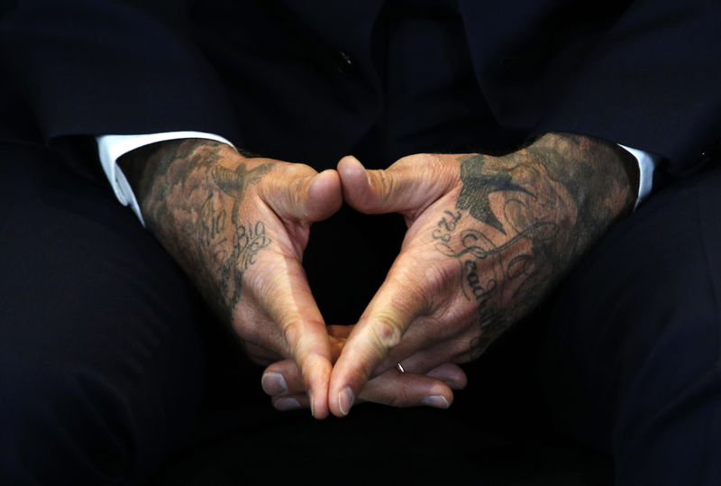 © Reuters. David Beckham speaks a press conference to mark his 10 years as a UNICEF Goodwill Ambassador, at Google's headquarters in central London