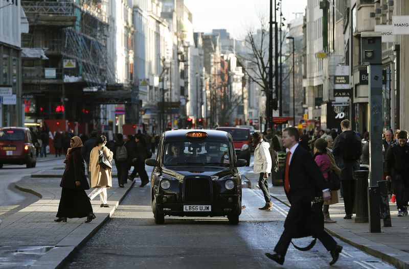 © Reuters. A taxi travels along Oxford Street during a bus strike in London