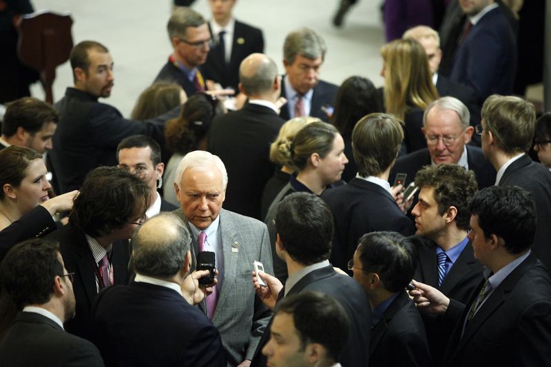 © Reuters. Hatch, Blunt and Alexander are interviewed by reporters as they arrive for the weekly Senate Republican caucus luncheon at the U.S. Capitol in Washington