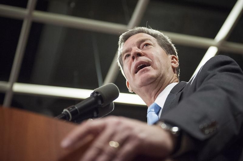 © Reuters. Republican Kansas Governor Brownback speaks to supporters after winning re-election in the U.S. midterm elections in Topeka