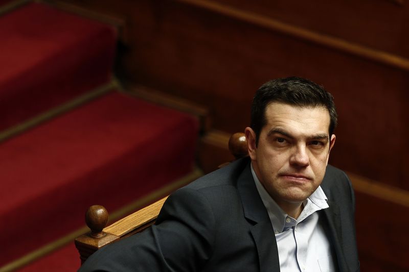 © Reuters. Greek PM Tsipras looks on during a parliamentary session before a vote of confidence in Athens