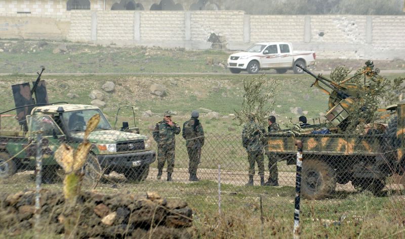 © Reuters. Combatentes leais ao presidente sírio retomam controle de Deir al-Adas