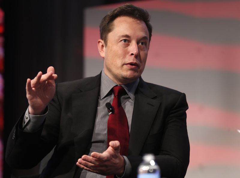 © Reuters. Tesla Motors CEO Musk talks at the Automotive World News Congress at the Renaissance Center in Detroit