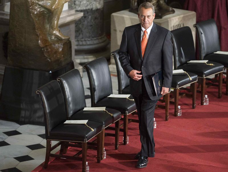 © Reuters. House Speaker John Boehner (R-OH) arrives for the dedication of a statue of the late Senator Barry Goldwater (R-AZ) at a ceremony held in Statuary Hall on Capitol Hill in Washington