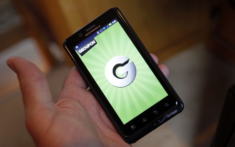 © Reuters. The Groupon smartphone app is displayed on a Motorola Droid Bionic cell phone in Denver