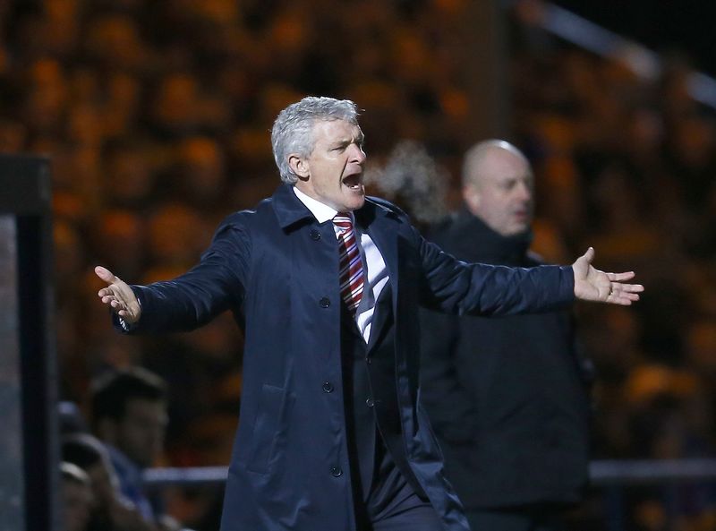 © Reuters. Stoke City manager Hughes reacts during their FA Cup fourth round soccer match against Rochdale at the Spotland stadium in Rochdale