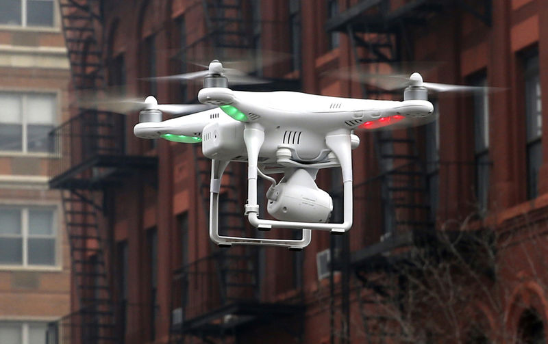 © Reuters. Camera drone flies near the scene where two buildings were destroyed in an explosion, in the East Harlem section in New York City