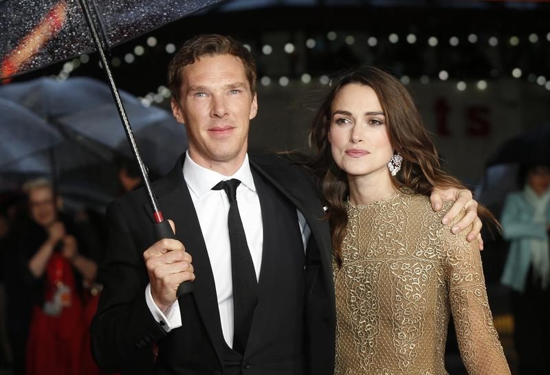 © Reuters. Actors Cumberbatch and Knightley pose as they arrive for the European premiere of the film "The Imitation Game" at the BFI opening night gala at Leicester Square in London