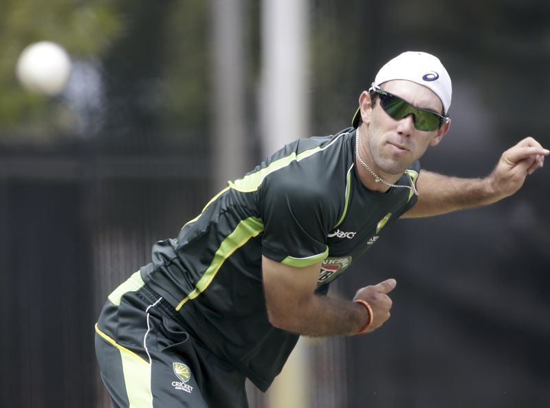 © Reuters. Australia's Glenn Maxwell bowls during cricket training at the WACA ground