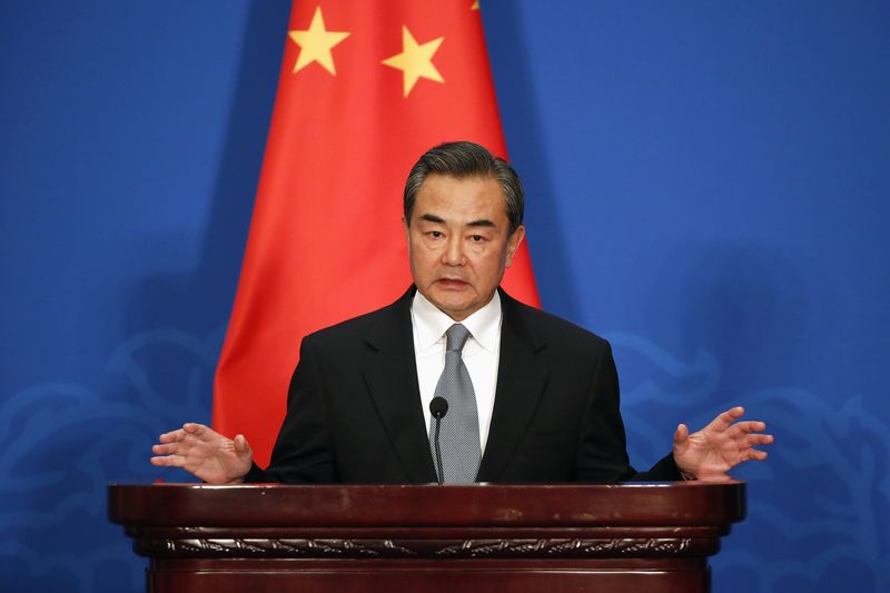 © Reuters. Chinese Foreign Minister Wang Yi attends a news conference after the 13th Russia-India-China Foreign Ministers' Meeting, at Diaoyutai State Guesthouse in Beijing
