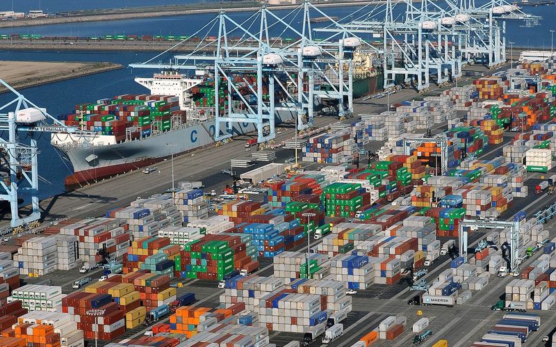 © Reuters. Shipping containers sit idle at the ports of Los Angeles and Long Beach in this file photo