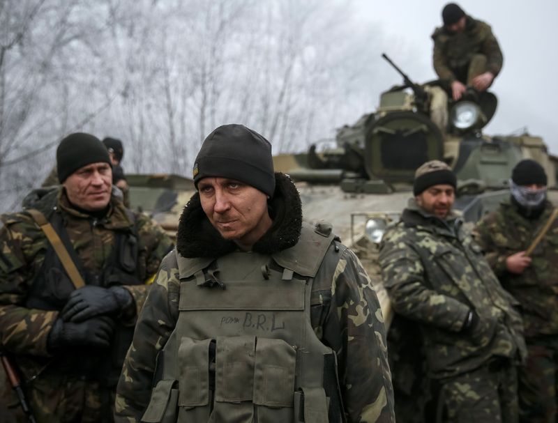 © Reuters. ألمانيا: ميركل وبوتين وبوروشينكو يتفقون على خطوات بشأن وقف إطلاق النار