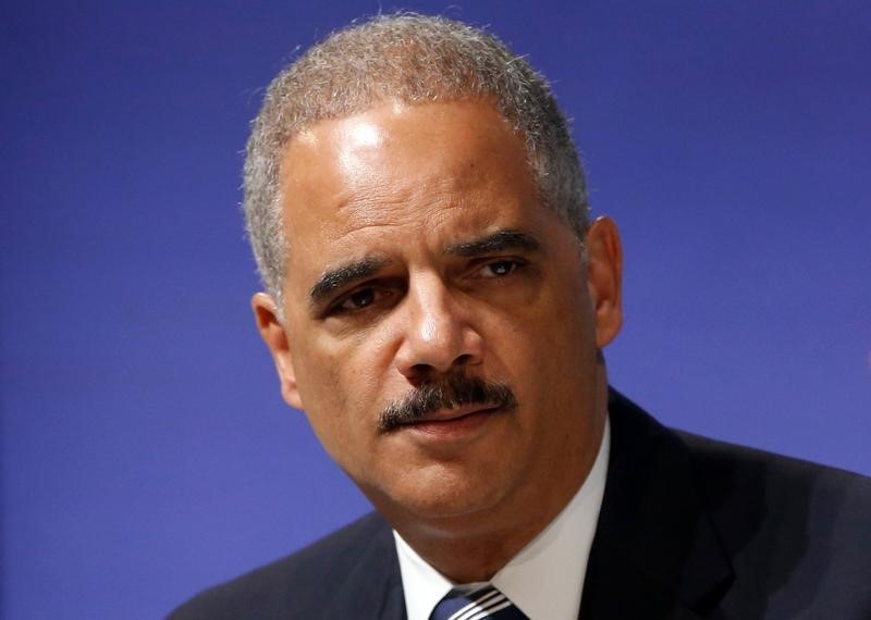 © Reuters. Holder participates in the Washington Ideas Forum, in Washington