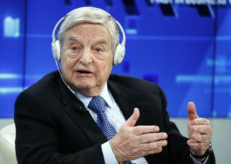 © Reuters. Soros, Chairman of Soros Fund Management, speaks during the session 'Recharging Europe' in the Swiss mountain resort of Davos
