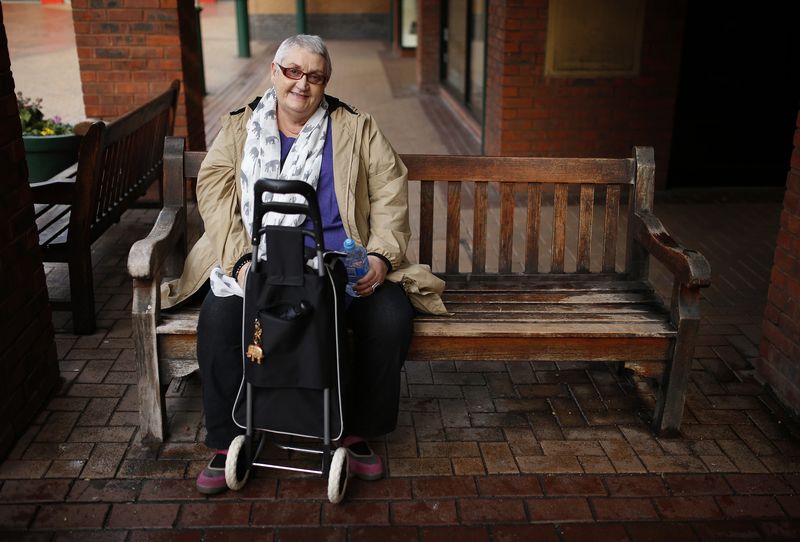 © Reuters. Pensioner Lambell poses for a photograph in central Sheffield