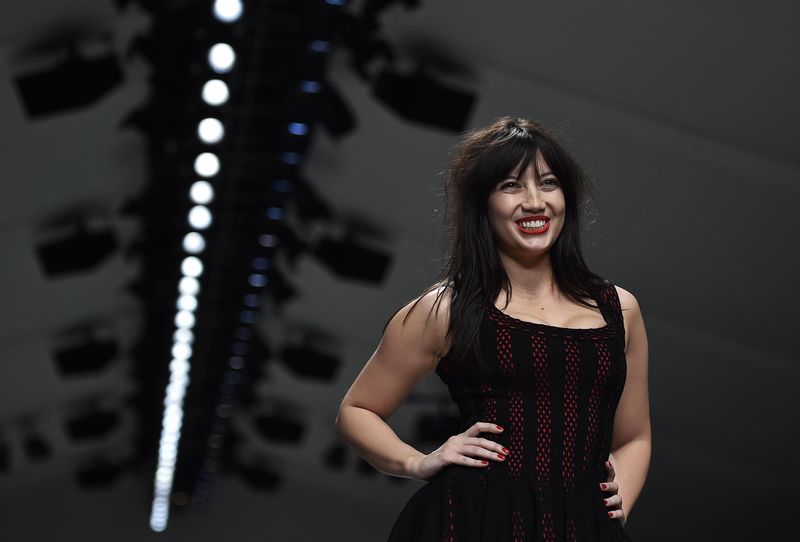 © Reuters. British model Daisy Lowe presents a creation during the Fashion for Relief charity catwalk show in London