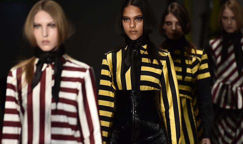 © Reuters. Models wear creations by House of Holland for the Autumn/Winter 2015 collection at London Fashion Week in London