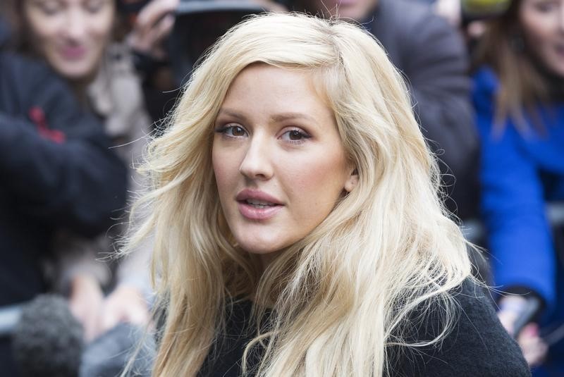 © Reuters. British singer Ellie Goulding arrives for the recording of the Band Aid 30 charity single in west London