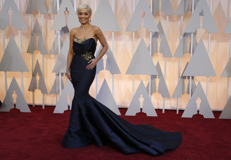 © Reuters. Singer songwriter Rita Ora arrives at the 87th Academy Awards in Hollywood