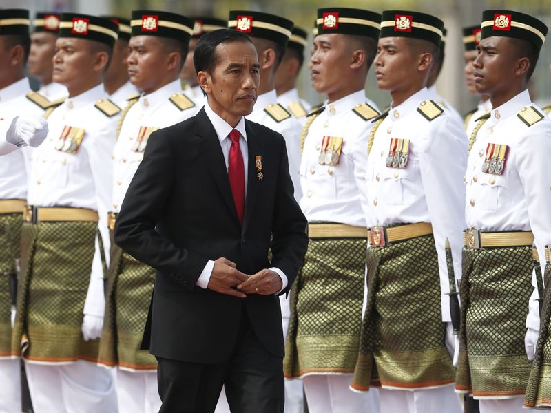 © Reuters. Presidente da Indonésia, Joko Widodo, durante cerimônia em Sepang, na Malásia