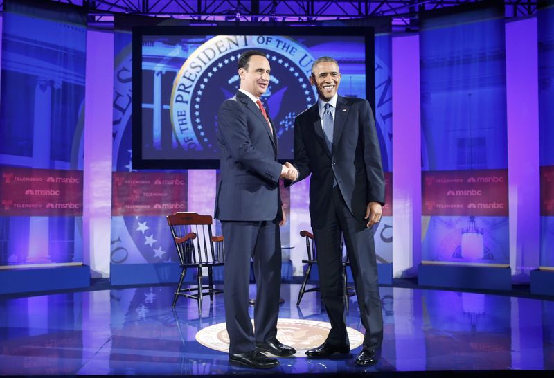 © Reuters. U.S. President Obama greets host Diaz-Balart after taping of MSNBC/Telemundo town hall discussion on immigration at Florida International University in Miami