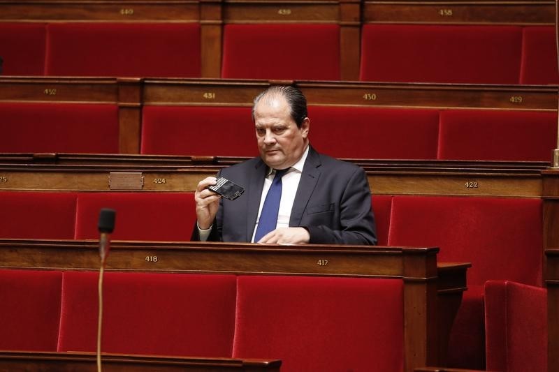 © Reuters. Jean-Christophe Cambadelis, French Socialist Party head and deputy, attends the questions to the government session at the National Assembly in Paris