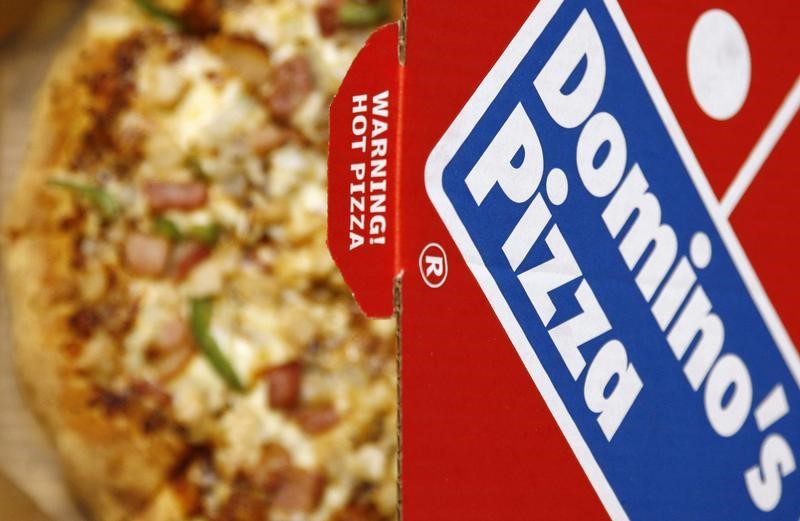 © Reuters. A Domino's Pizza is pictured in its box in central London