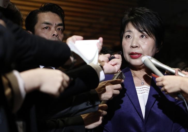 © Reuters. Japan's newly-appointed Justice Minister Kamikawa speaks to the media after visiting Japan's Prime Minister Shinzo Abe at his official residence in Tokyo