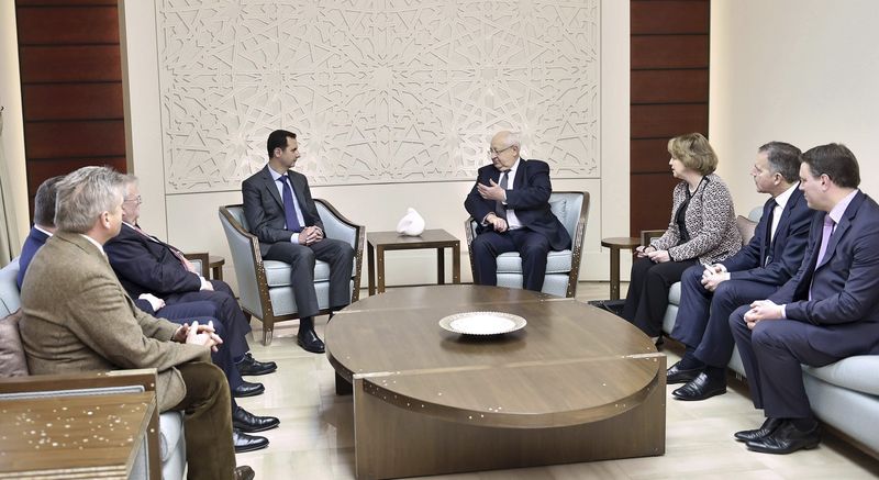 © Reuters. Syria's President Bashar al-Assad meets with a French delegation headed by Senate member, Head of the Senates French-Syrian Friendship Committee Jean-Pierre Vial,in Damascus