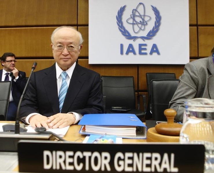 © Reuters. IAEA Director General Amano waits for start of a board of governors meeting at the IAEA headquarters in Vienna