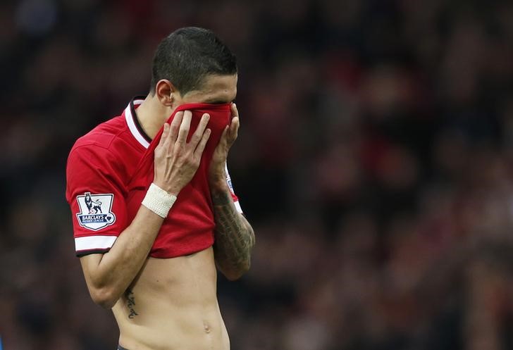 © Reuters. Di María volverá a su mejor nivel y brillará en el Manchester United, dice Rooney