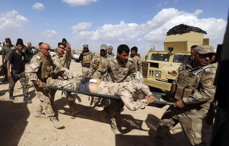 © Reuters. قوات عراقية تحاول محاصرة مقاتلي الدولة الاسلامية حول تكريت