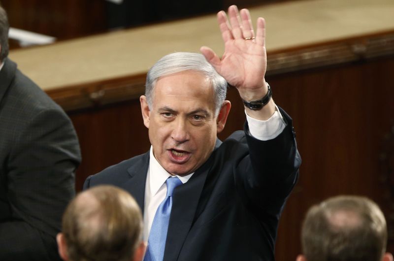 © Reuters. Israeli Prime Minister Netanyahu waves prior to addressing a joint meeting of Congress on Capitol Hill in Washington
