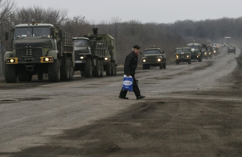 © Reuters. LES OCCIDENTAUX MENACENT D'UNE RÉACTION FORTE EN CAS DE NON-RESPECT DE L'ACCORD DE MINSK