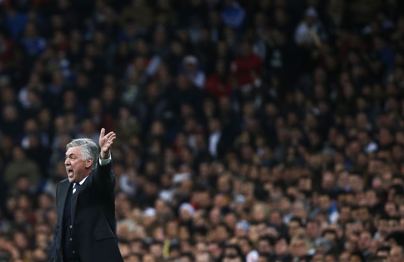 © Reuters. Real Madrid's coach Ancelotti reacts during their Spanish first division soccer match against Villarreal at Santiago Bernabeu stadium in Madrid