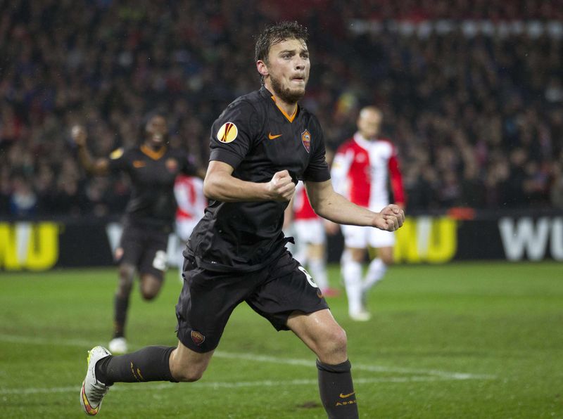 © Reuters. Adem Ljajic of AS Roma celebrates his goal against Feyenoord during their Europa League round of 32 second leg soccer match at the Kuip stadium in Rotterdam