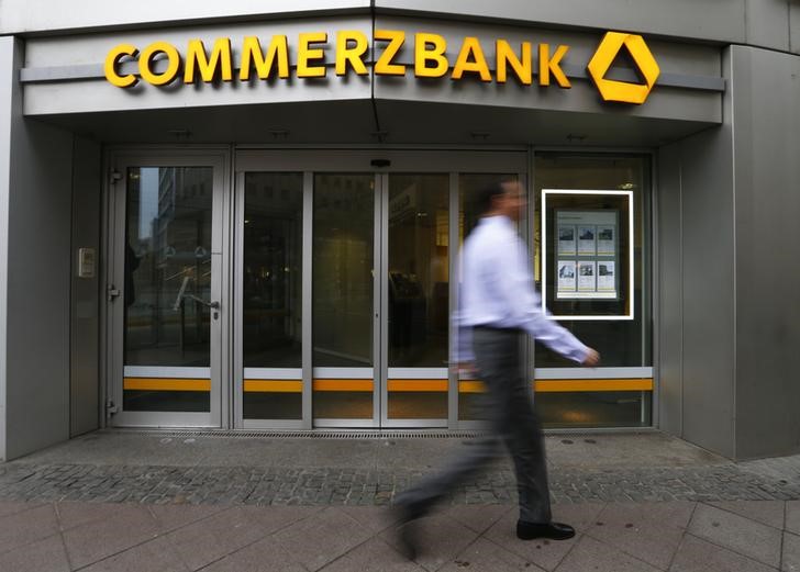© Reuters. A man walks past a branch of Commerzbank ahead of the bank's annual news conference in Frankfurt