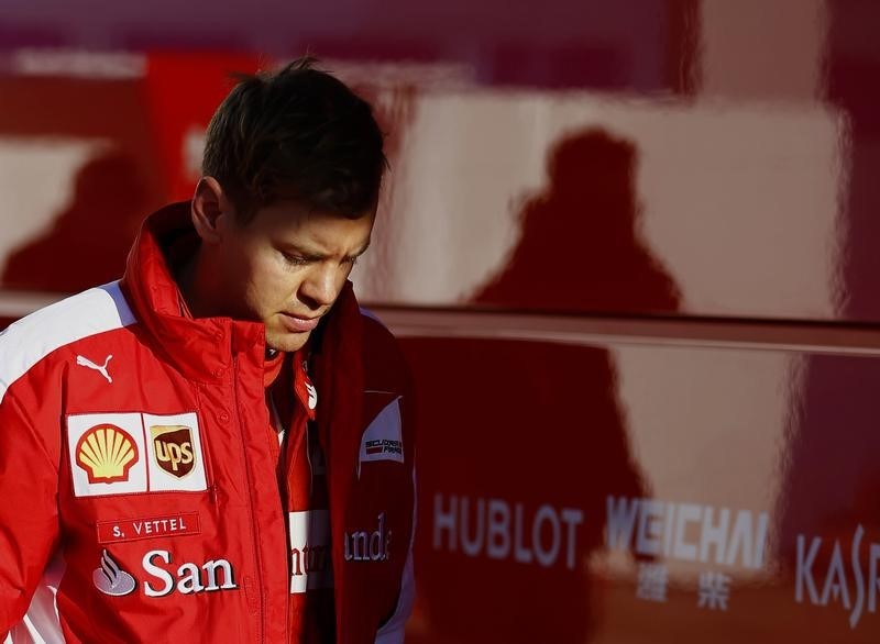 © Reuters. Ferrari F1 racing driver Sebastian Vettel of Germany is seen in the paddock at the Jerez racetrack in southern Spain