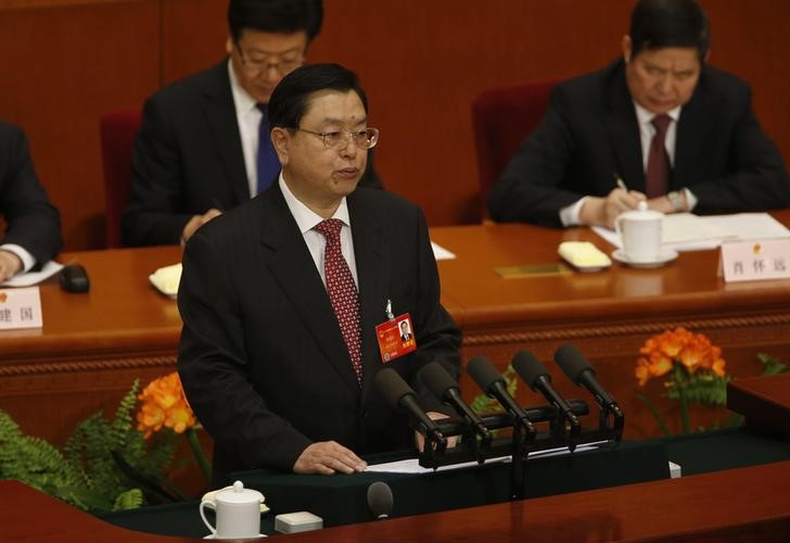 © Reuters. Chairman of the Standing Committee of the NPC Zhang delivers a work report during a plenary session of the NPC at the Great Hall of the People in Beijing