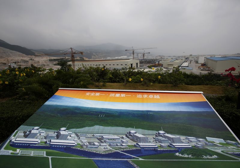 © Reuters. An artist impression of Taishan Nuclear Power Plant is displayed on a viewing platform overlooking the construction site in Taishan, China