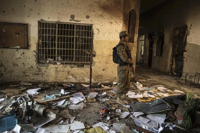 © Reuters. An army soldier stands in the Army Public School, which was attacked by Taliban gunmen, in Peshawar