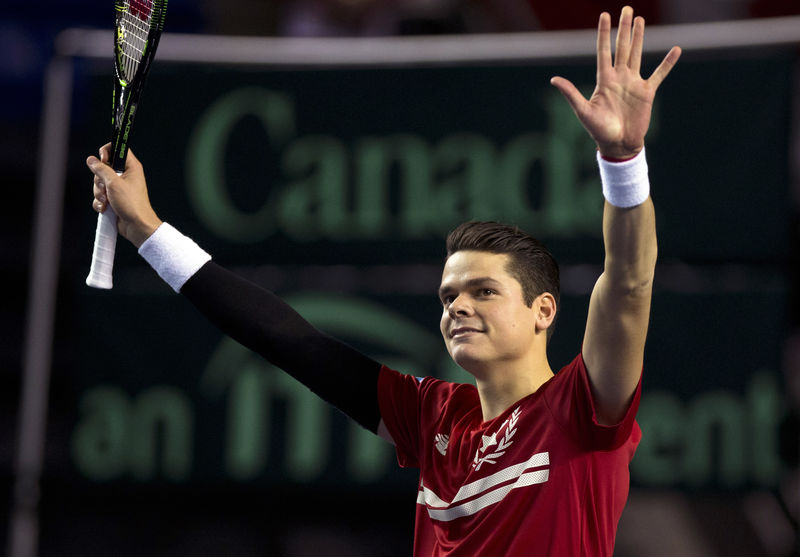 © Reuters. Canada's Raonic reacts after beating Japan's Ito during their Davis Cup tennis match at the Doug Mitchell Thunderbird Sports Centre in Vancouver