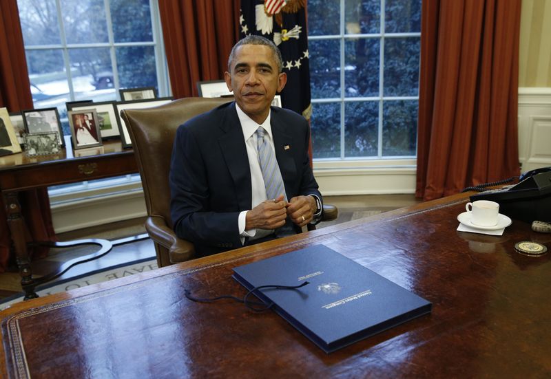 © Reuters. أوباما ينتقد مدينة فيرجسون بسبب الأعمال "القمعية" ضد الأمريكيين الافارقة