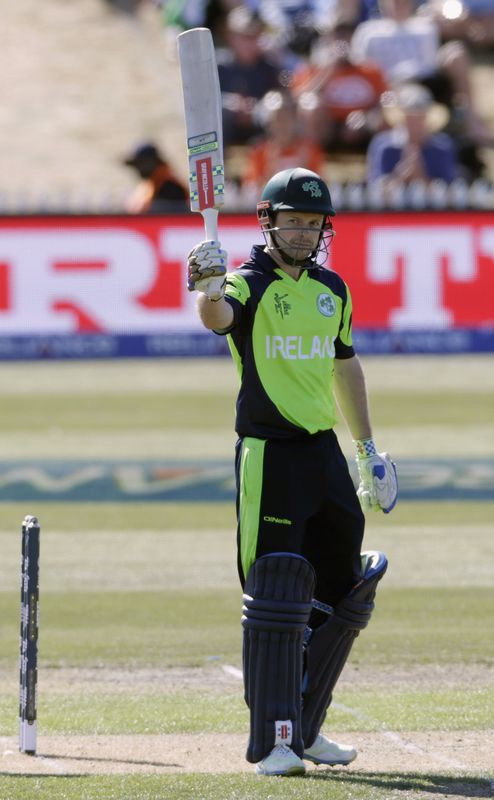 © Reuters. Ireland's Joyce salutes his 50 during their Cricket World Cup match against the West Indies in Nelson