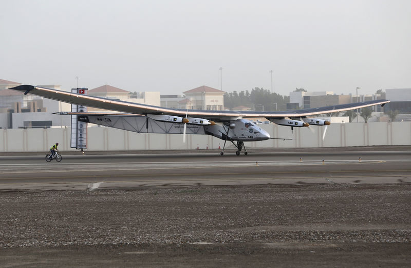 © Reuters. The Solar Impulse 2 takes off at airport in Abu Dhabi