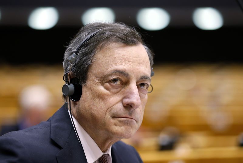 © Reuters. ECB President Draghi takes part in a plenary debate on the ECB's Annual Report 2013 at the EU Parliament in Brussels